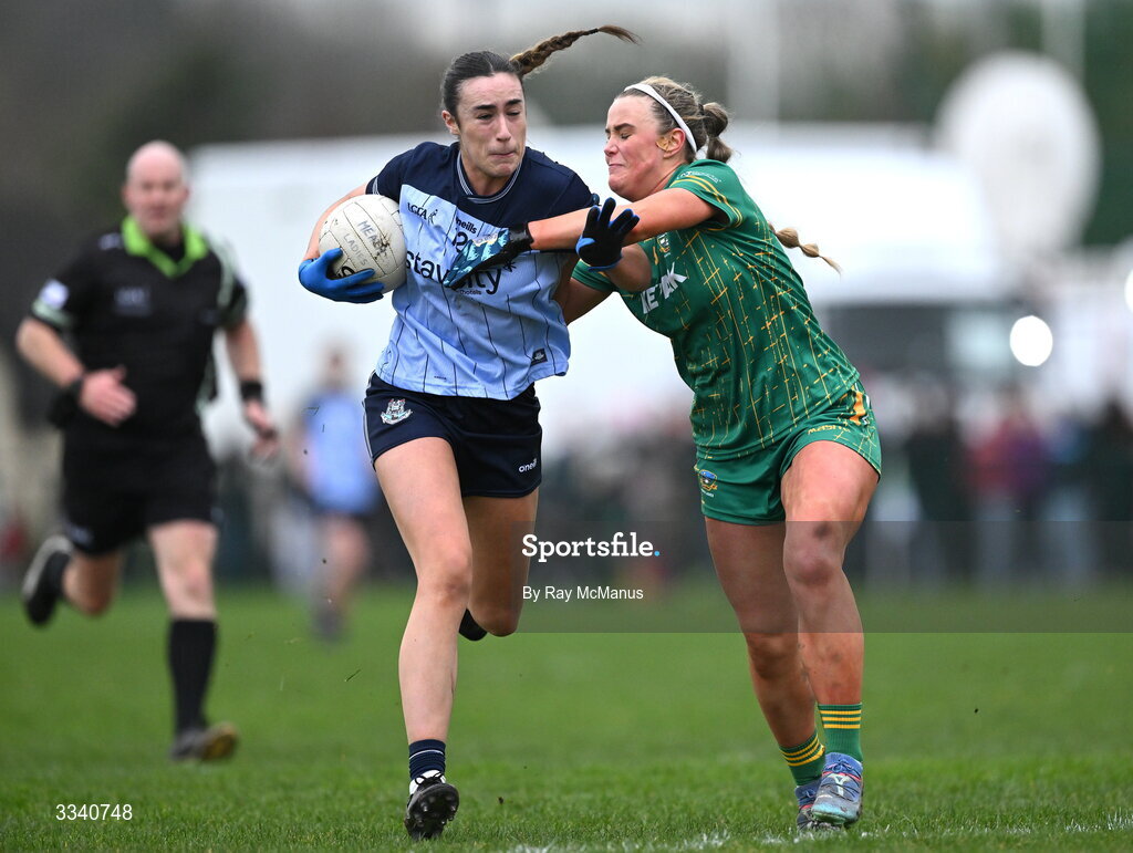 2 February 2026; Kate Donaghy of Dublin is tackled by Órla Smith of Meath during the Lidl Ladies National Football League Division 1 Round 2 match between Meath and Dublin at St Patrick’s GFC in Stamullen, Meath. Photo by Ray McManus/Sportsfile