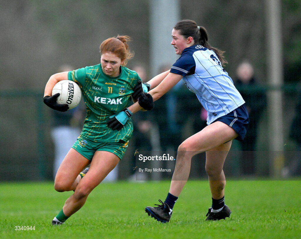 2 February 2026; Ciara Smyth of Meath is tackled by Hannah McGinnis of Dublin during the Lidl Ladies National Football League Division 1 Round 2 match between Meath and Dublin at St Patrick’s GFC in Stamullen, Meath. Photo by Ray McManus/Sportsfile