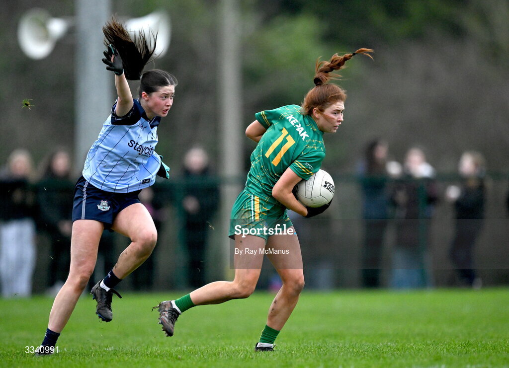 2 February 2026; Ciara Smyth of Meath is tackled by Hannah McGinnis of Dublin during the Lidl Ladies National Football League Division 1 Round 2 match between Meath and Dublin at St Patrick’s GFC in Stamullen, Meath. Photo by Ray McManus/Sportsfile