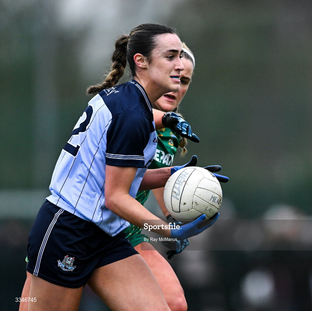 2 February 2026; Kate Donaghy of Dublin is tackled by Órla Smith of Meath during the Lidl Ladies National Football League Division 1 Round 2 match between Meath and Dublin at St Patrick’s GFC in Stamullen, Meath. Photo by Ray McManus/Sportsfile
