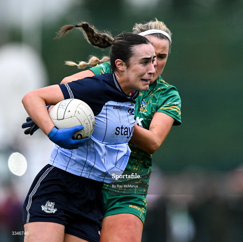 2 February 2026; Kate Donaghy of Dublin is tackled by Órla Smith of Meath during the Lidl Ladies National Football League Division 1 Round 2 match between Meath and Dublin at St Patrick’s GFC in Stamullen, Meath. Photo by Ray McManus/Sportsfile