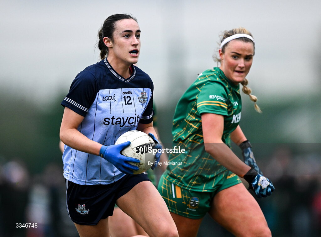 2 February 2026; Kate Donaghy of Dublin is tackled by Órla Smith of Meath during the Lidl Ladies National Football League Division 1 Round 2 match between Meath and Dublin at St Patrick’s GFC in Stamullen, Meath. Photo by Ray McManus/Sportsfile