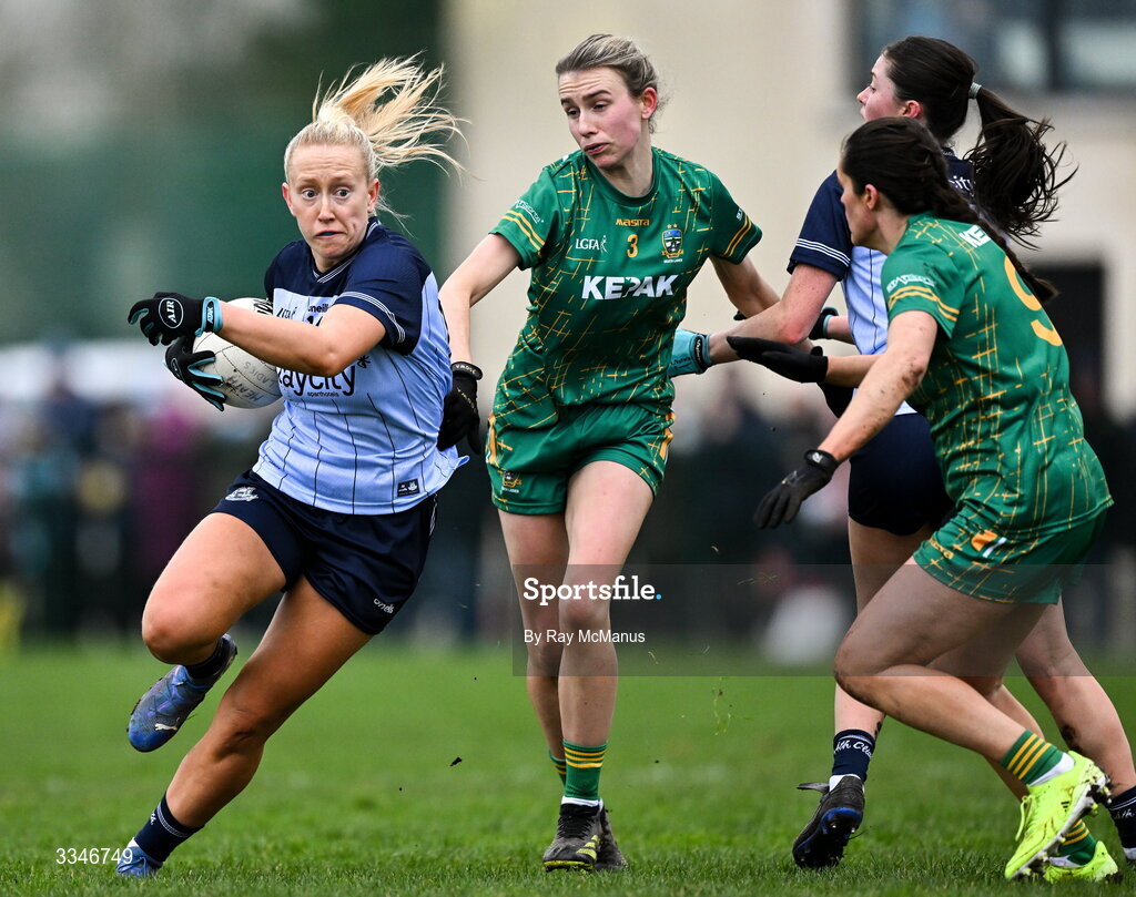 2 February 2026; Jodi Egan of Dublin is tackled by Mary Kate Lynch, 3, and Niamh Gallogly of Meath  during the Lidl Ladies National Football League Division 1 Round 2 match between Meath and Dublin at St Patrick’s GFC in Stamullen, Meath. Photo by Ray McManus/Sportsfile