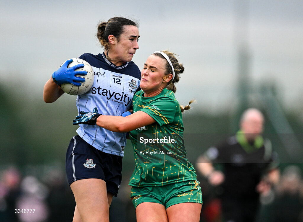 2 February 2026; Kate Donaghy of Dublin is tackled by Órla Smith of Meath during the Lidl Ladies National Football League Division 1 Round 2 match between Meath and Dublin at St Patrick’s GFC in Stamullen, Meath. Photo by Ray McManus/Sportsfile