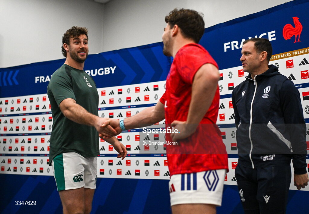 5 February 2026; Caelan Doris of Ireland and Antoine Dupont of France shake hands in front of referee Karl Dickson before the Guinness 6 Nations Rugby Championship match between France and Ireland at Stade de France in Paris, France. Photo by Brendan Moran/Sportsfile