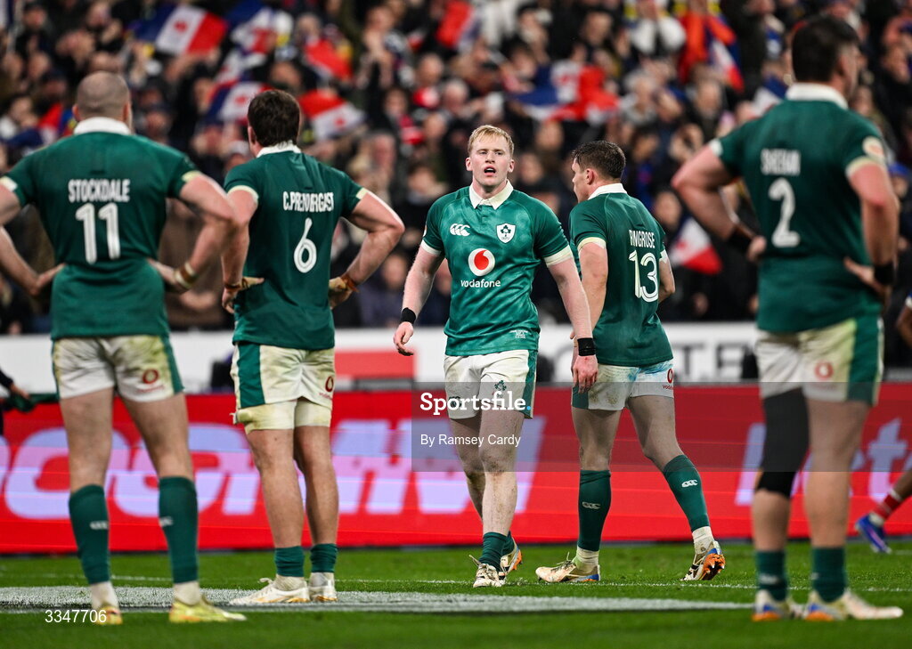 5 February 2026; Jamie Osborne of Ireland, centre, and team mates after conceding a third try during the Guinness 6 Nations Rugby Championship match between France and Ireland at Stade de France in Paris, France. Photo by Ramsey Cardy/Sportsfile