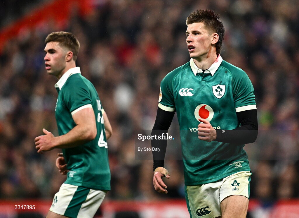 5 February 2026; Sam Prendergast of Ireland, right, and Jack Crowley during the Guinness 6 Nations Rugby Championship match between France and Ireland at Stade de France in Paris, France. Photo by Seb Daly/Sportsfile