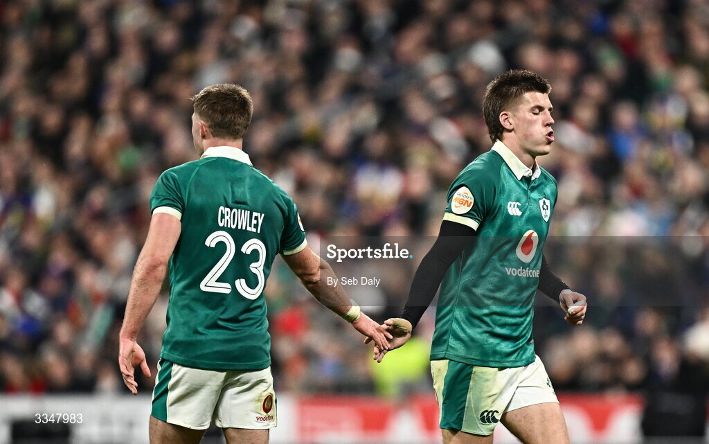 5 February 2026; Ireland players Sam Prendergast, right, and Jack Crowley during the Guinness 6 Nations Rugby Championship match between France and Ireland at Stade de France in Paris, France. Photo by Seb Daly/Sportsfile
