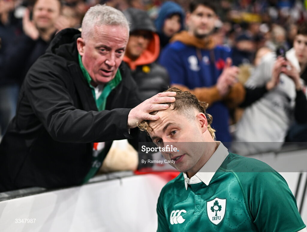 5 February 2026; Craig Casey of Ireland with his father Ger after the Guinness 6 Nations Rugby Championship match between France and Ireland at Stade de France in Paris, France. Photo by Ramsey Cardy/Sportsfile