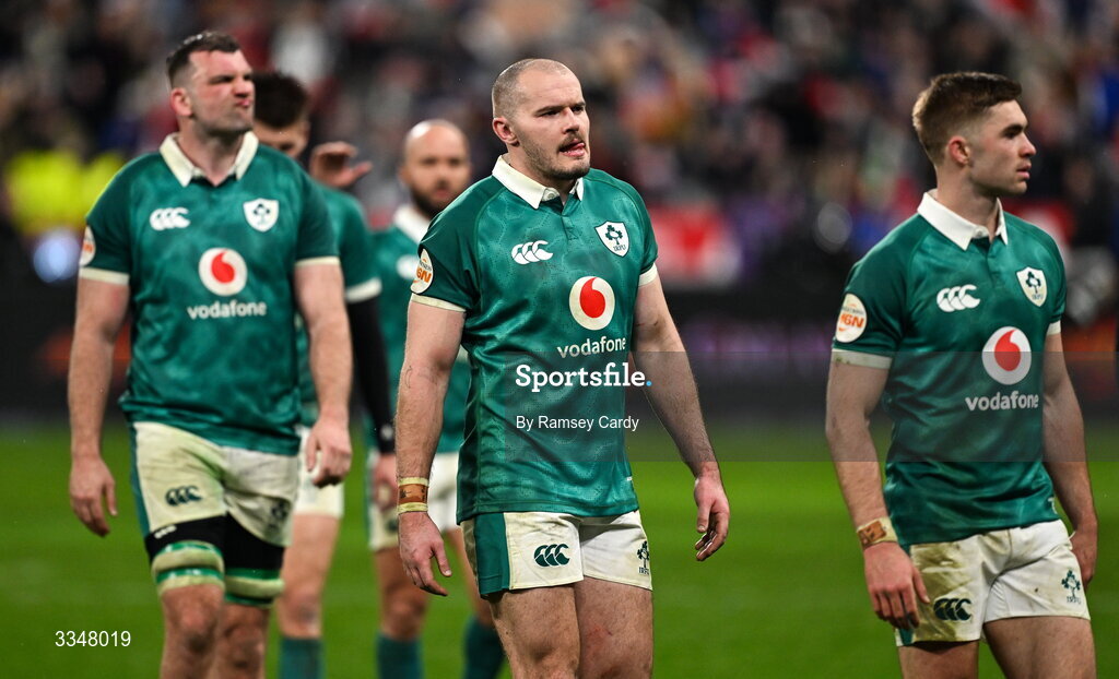 5 February 2026; Jacob Stockdale of Ireland, centre, and teammates Jack Crowley, right, and Tadhg Beirne, left, after the Guinness 6 Nations Rugby Championship match between France and Ireland at Stade de France in Paris, France. Photo by Ramsey Cardy/Sportsfile