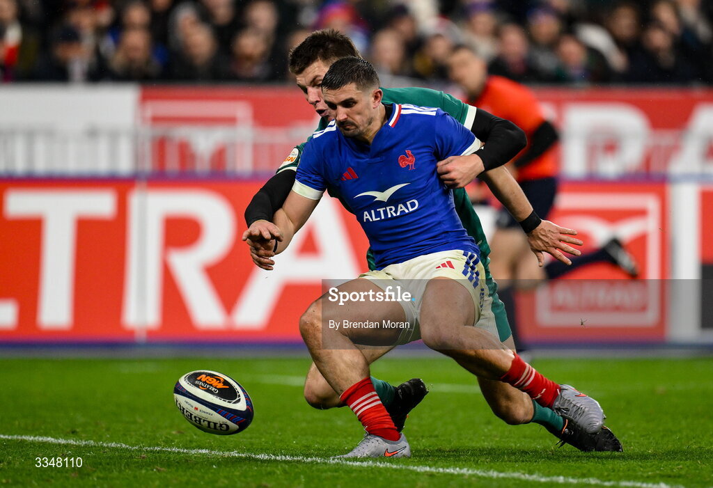 5 February 2026; Thomas Ramos of France gets to the ball ahead of Sam Prendergast of Ireland in the in-goal area during the Guinness 6 Nations Rugby Championship match between France and Ireland at Stade de France in Paris, France. Photo by Brendan Moran/Sportsfile