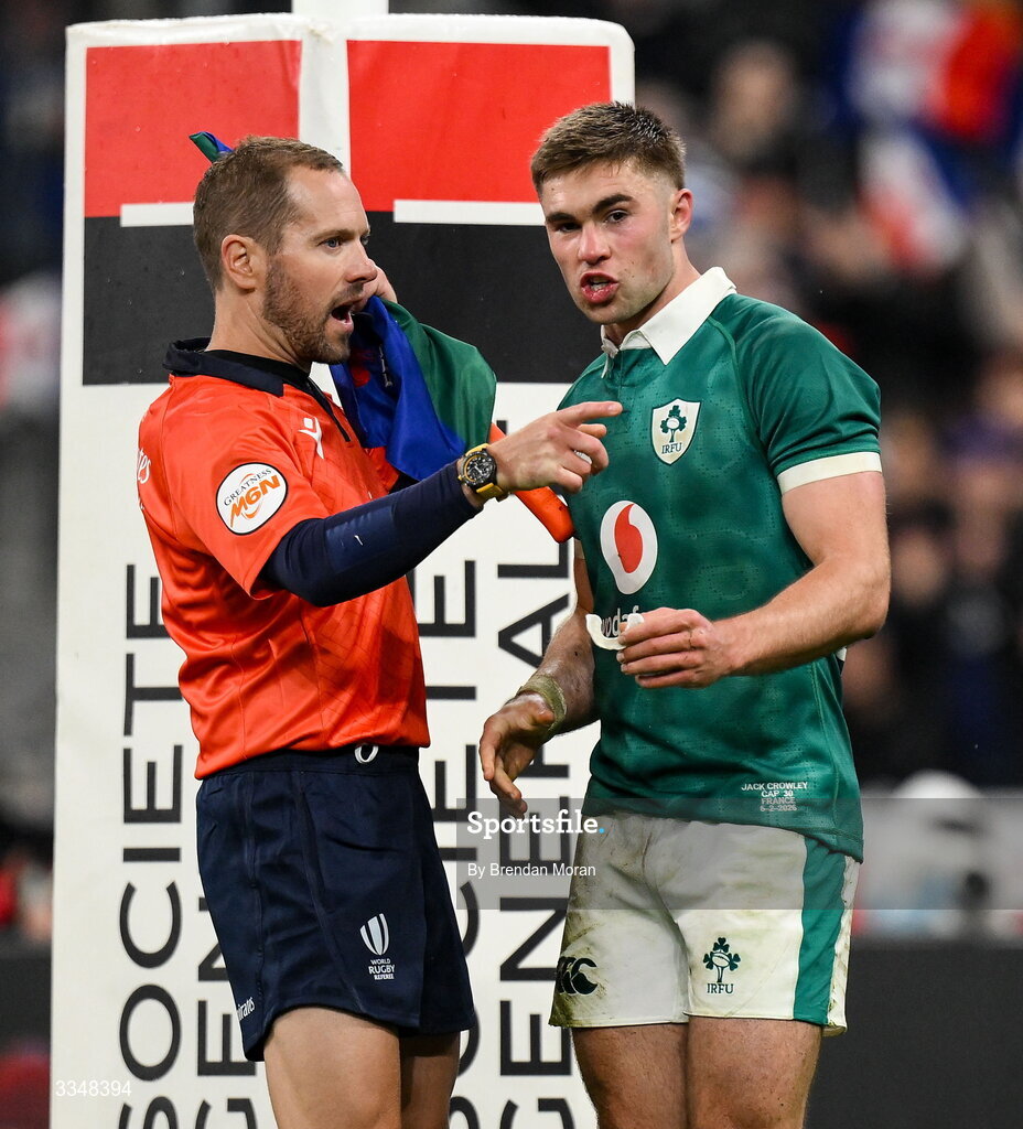 5 February 2026; Jack Crowley of Ireland speaks with assistant referee Angus Gardner after during the Guinness 6 Nations Rugby Championship match between France and Ireland at Stade de France in Paris, France. Photo by Brendan Moran/Sportsfile