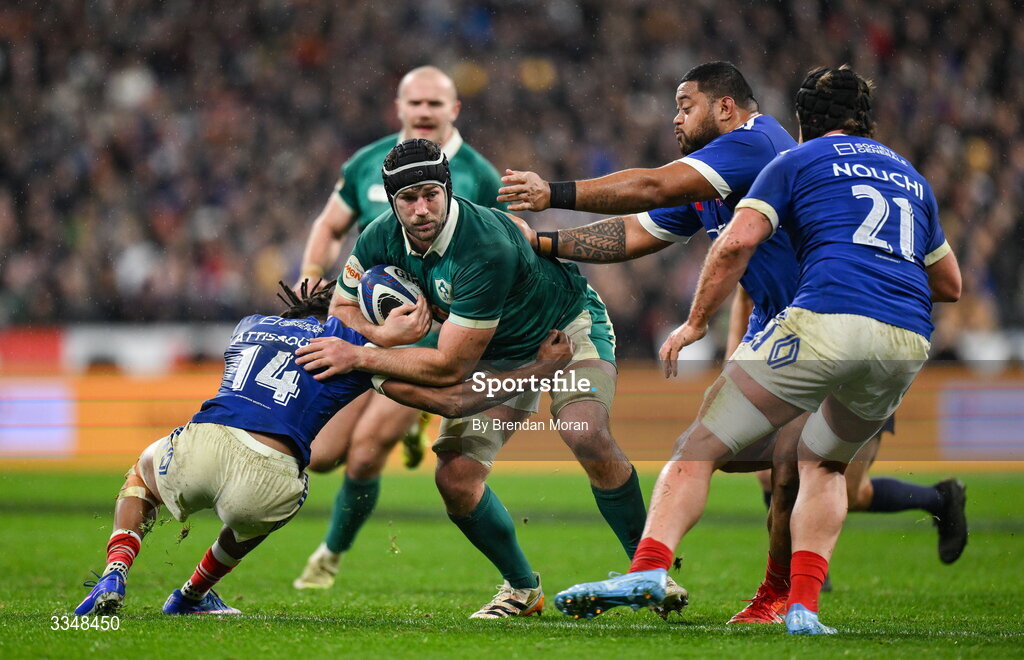 5 February 2026; Caelan Doris of Ireland is tackled by Théo Attissogbe of France during the Guinness 6 Nations Rugby Championship match between France and Ireland at Stade de France in Paris, France. Photo by Brendan Moran/Sportsfile