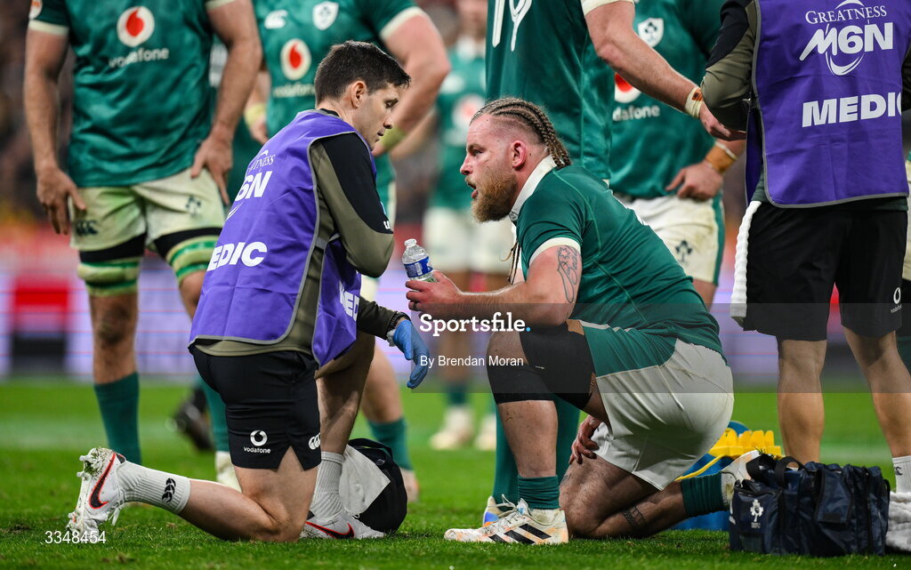 5 February 2026; Finlay Bealham of Ireland receives medical attention from team doctor Stuart O'Flanagan during the Guinness 6 Nations Rugby Championship match between France and Ireland at Stade de France in Paris, France. Photo by Brendan Moran/Sportsfile