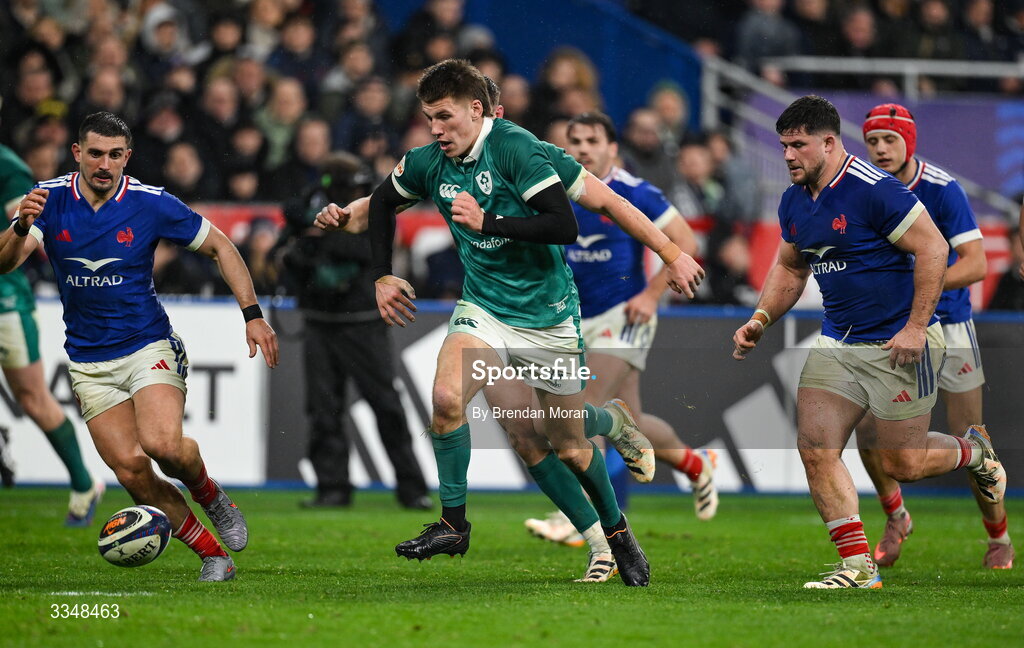 5 February 2026; Sam Prendergast of Ireland and Thomas Ramos of France, left, race afor a loose ball during the Guinness 6 Nations Rugby Championship match between France and Ireland at Stade de France in Paris, France. Photo by Brendan Moran/Sportsfile
