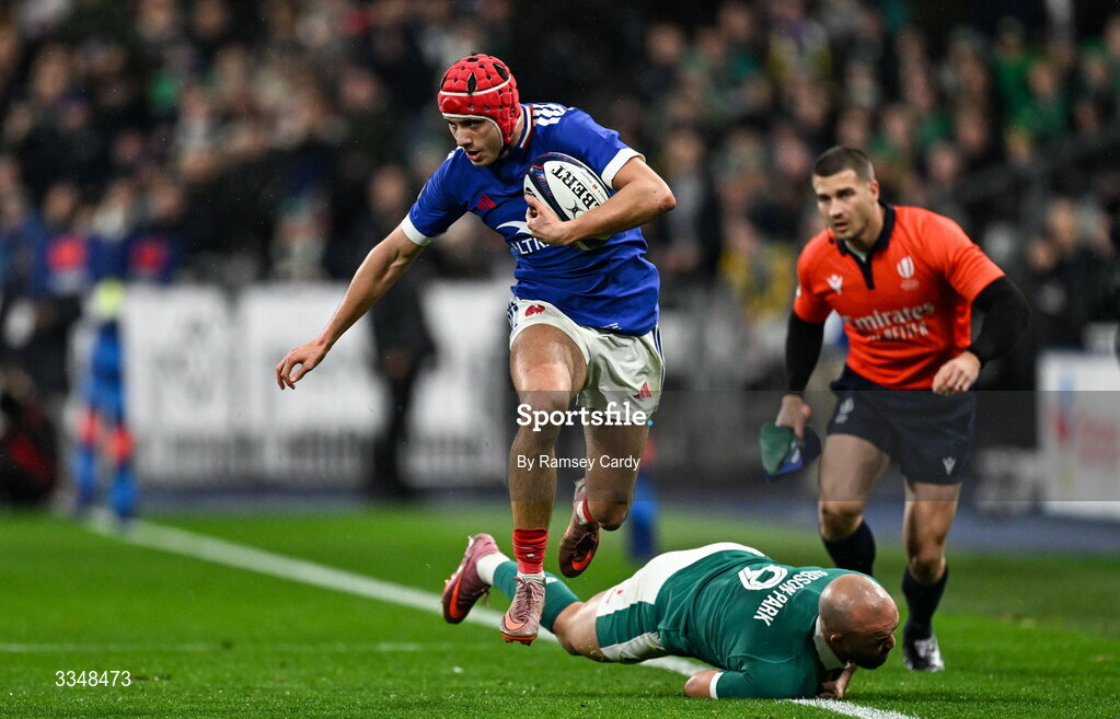 5 February 2026; Louis Bielle-Biarrey of France evades the tackle of Jamison Gibson-Park of Ireland during the Guinness 6 Nations Rugby Championship match between France and Ireland at Stade de France in Paris, France. Photo by Ramsey Cardy/Sportsfile
