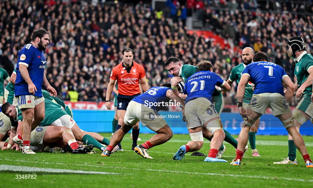 5 February 2026; Jack Conan of Ireland is tackled by Peato Mauvaka and Lenni Nouchi of France during the Guinness 6 Nations Rugby Championship match between France and Ireland at Stade de France in Paris, France. Photo by Brendan Moran/Sportsfile