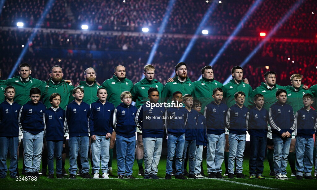 5 February 2026; Ireland players, from left, Nick Timoney, Finlay Bealham, Jeremy Loughman, Jacob Stockdale, Jamie Osborne, Joe McCarthy, Cian Prendergast, Sam Prendergast, Thomas Clarkson and Tommy O'Brien stand for the national anthems before during the Guinness 6 Nations Rugby Championship match between France and Ireland at Stade de France in Paris, France. Photo by Brendan Moran/Sportsfile