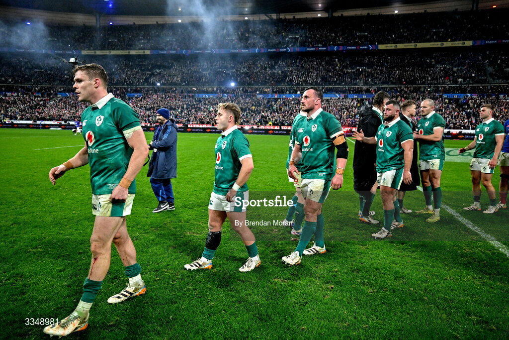 5 February 2026; Ireland players, from left, Garry Ringrose, Craig Casey, Rónan Kelleher and Michael Milne after the Guinness 6 Nations Rugby Championship match between France and Ireland at Stade de France in Paris, France. Photo by Brendan Moran/Sportsfile