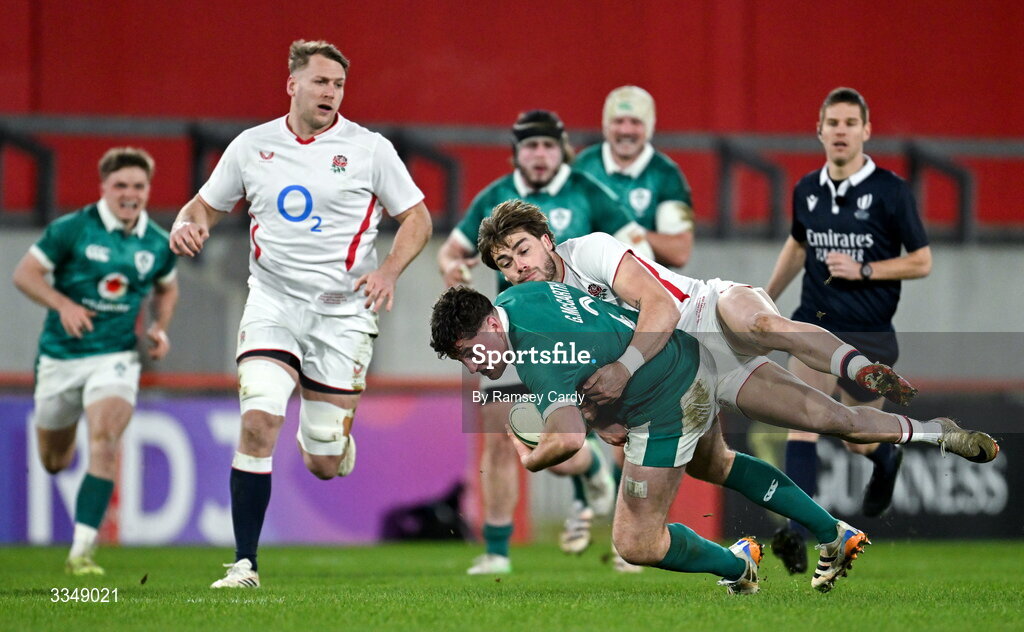 6 February 2026; Gus McCarthy of Ireland XV is tackled by Ollie Hassell-Collins of England A during the representative fixture rugby union match between Ireland XV and England A at Thomond Park in Limerick. Photo by Ramsey Cardy/Sportsfile