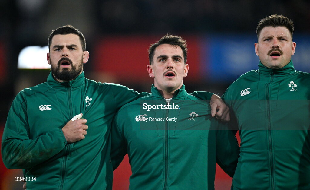 6 February 2026; Ireland XV captain Max Deegan, left, with teammates James Hume and Fineen Wycherley, right, during Ireland's Call before the representative fixture rugby union match between Ireland XV and England A at Thomond Park in Limerick. Photo by Ramsey Cardy/Sportsfile