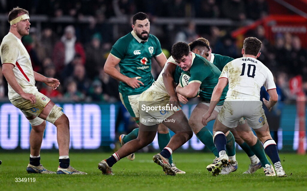 6 February 2026; Gus McCarthy of Ireland XV is tackled by Tarek Haffar and Billy Searle of England A during the representative fixture rugby union match between Ireland XV and England A at Thomond Park in Limerick. Photo by Ramsey Cardy/Sportsfile