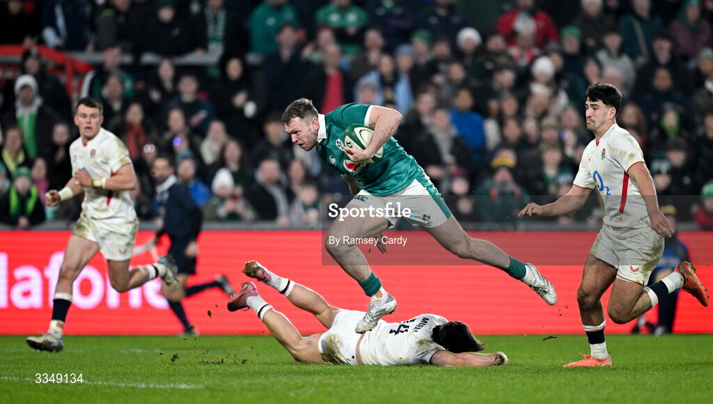 6 February 2026; Cathal Forde of Ireland XV evades the tackle of Cadan Murley of England A on the way to score his side's third try, which was subsequently disallowed for a knock on, during the representative fixture rugby union match between Ireland XV and England A at Thomond Park in Limerick. Photo by Ramsey Cardy/Sportsfile