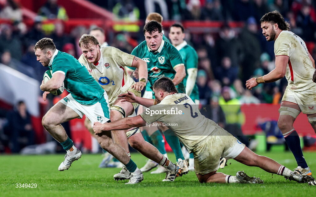 6 February 2026; Cathal Forde of Ireland is tackled by Jamie Blamire of England during the representative fixture rugby union match between Ireland XV and England A at Thomond Park in Limerick. Photo by John Dickson/Sportsfile