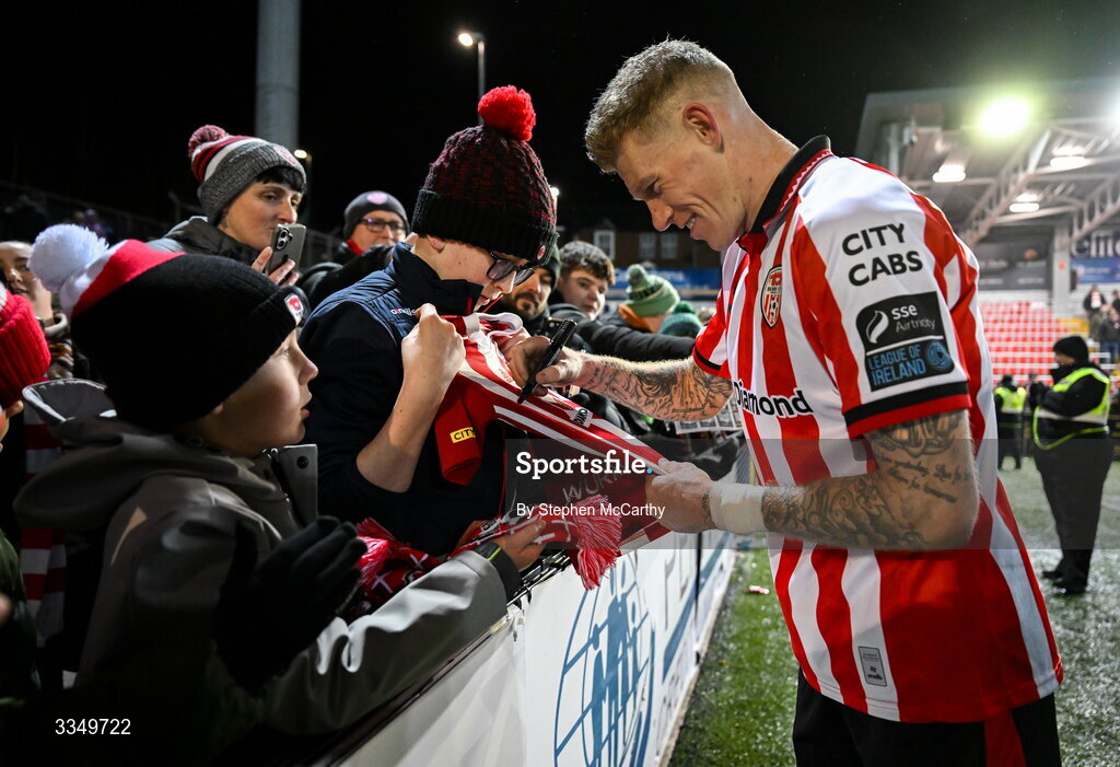 6 February 2026; James McClean of Derry City signs autographs for supporters after the SSE Airtricity Men's Premier Division match between Derry City and Sligo Rovers at The Ryan McBride Brandywell Stadium in Derry. Photo by Stephen McCarthy/Sportsfile