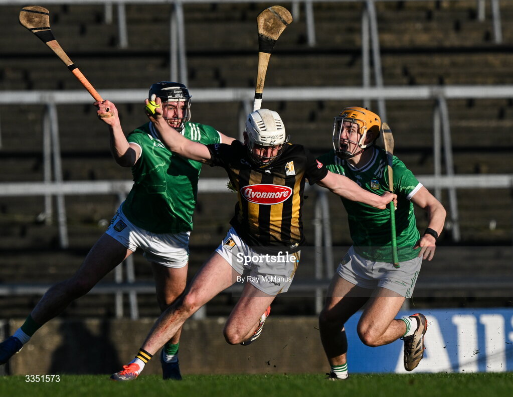 8 February 2026; Jordan Molloy of Kilkenny is tackled by Aidan O'Connor, left, and Adam English of Limerick during the Allianz Hurling League Division 1A match between Limerick and Kilkenny at TUS Gaelic Grounds in Limerick. Photo by Ray McManus/Sportsfile