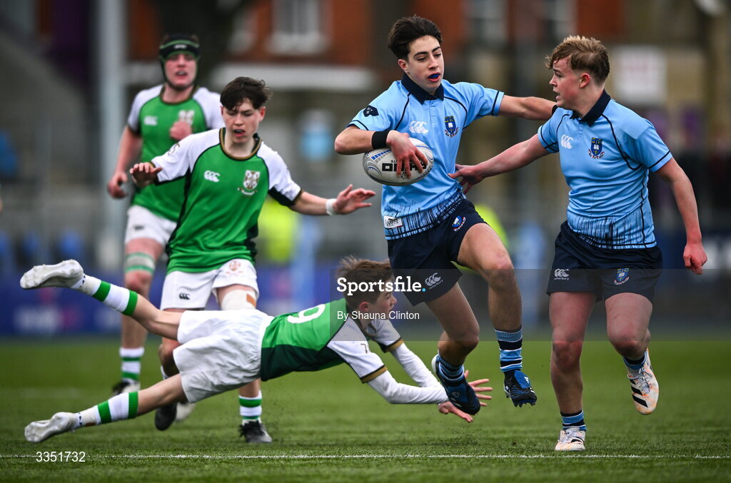 9 February 2026; Oisin Crehan of St Michael’s College evades the tackle of Ben Glynn of Gonzaga College during the Bank of Ireland Leinster Rugby Boys Schools Junior Cup First Round match between Gonzaga College and St Michael’s College at Energia Park in Dublin. Photo by Shauna Clinton/Sportsfile