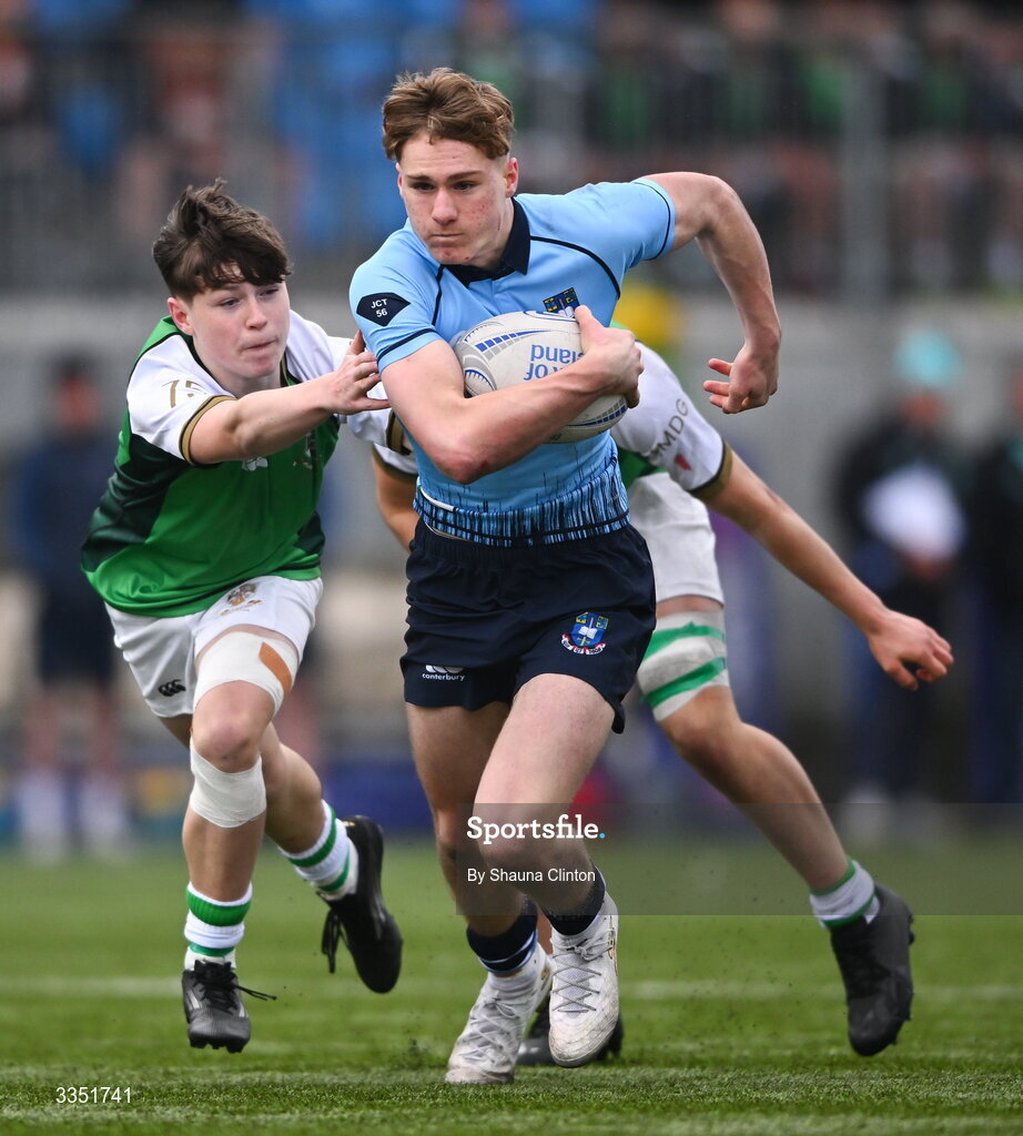 9 February 2026; Myles Carroll of St Michael’s College is tackled by Daniel Friel of Gonzaga College during the Bank of Ireland Leinster Rugby Boys Schools Junior Cup First Round match between Gonzaga College and St Michael’s College at Energia Park in Dublin. Photo by Shauna Clinton/Sportsfile
