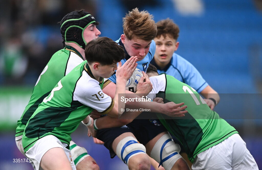 9 February 2026; Daniel Meijer of St Michael’s College is tackled by Gonzaga College players Daniel Friel, left, and Robert Callanan during the Bank of Ireland Leinster Rugby Boys Schools Junior Cup First Round match between Gonzaga College and St Michael’s College at Energia Park in Dublin. Photo by Shauna Clinton/Sportsfile