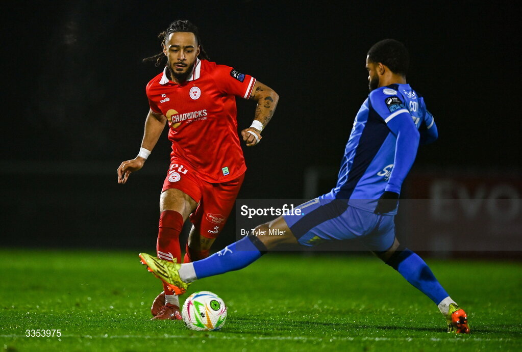 6 February 2026; Milan Mbeng of Shelbourne in action against Trae Coyle of Waterford during the SSE Airtricity Men's Premier Division match between Waterford and Shelbourne at the Regional Sports Centre in Waterford. Photo by Tyler Miller/Sportsfile