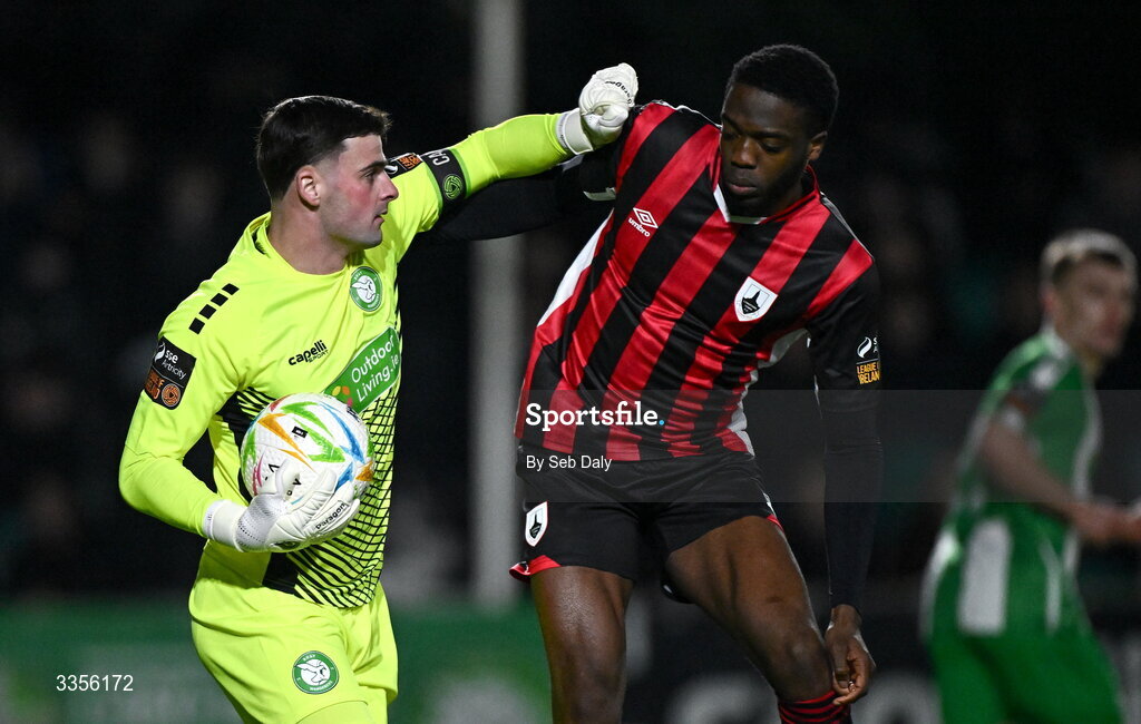 13 February 2026; Bray Wanderers goalkeeper Jimmy Corcoran in action against Cole Omorehiomwan of Longford Town during the SSE Airtricity Men's First Division match between Bray Wanderers and Longford Town at Carlisle Grounds in Bray, Wicklow. Photo by Seb Daly/Sportsfile