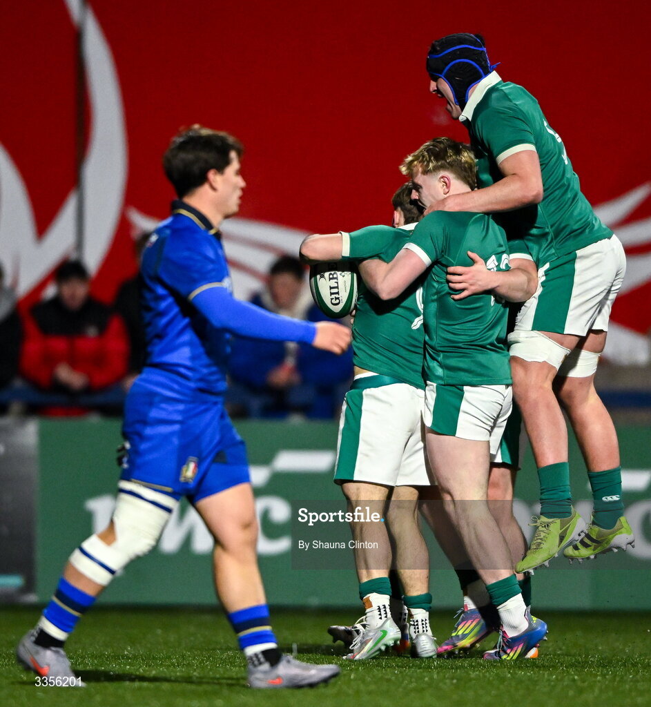 13 February 2026; Christopher Barrett of Ireland, left, celebrates with  team-mates after scoring his side's first try during the U20 Six Nations Rugby Championship match between Ireland and Italy at Virgin Media Park in Cork. Photo by Shauna Clinton/Sportsfile
