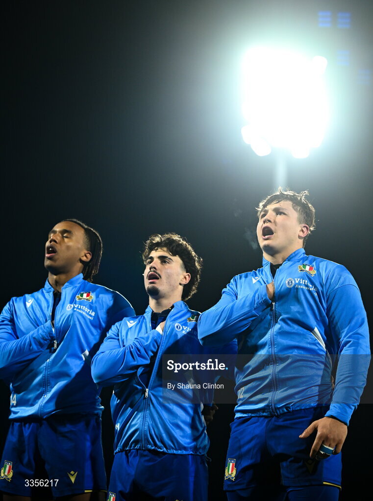 13 February 2026; Italy players stand for the playing of the national anthems ahead of the U20 Six Nations Rugby Championship match between Ireland and Italy at Virgin Media Park in Cork. Photo by Shauna Clinton/Sportsfile