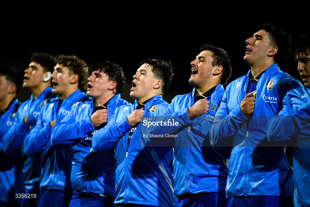 13 February 2026; Italy players stand for the playing of the national anthems ahead of the U20 Six Nations Rugby Championship match between Ireland and Italy at Virgin Media Park in Cork. Photo by Shauna Clinton/Sportsfile