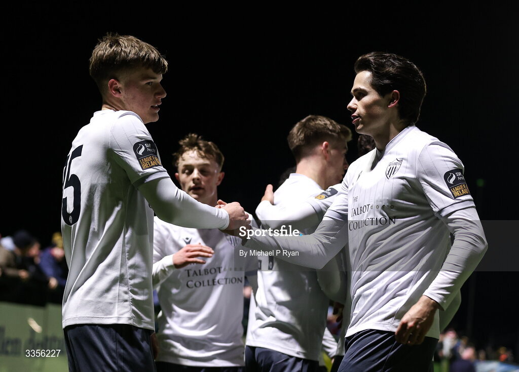 13 February 2026; Ryan Ritchie of Wexford, left, is congratulated by team-mate Adam Verdon after scoring his sides first goal during the SSE Airtricity Men's First Division match between Cobh Ramblers and Wexford at St Colman's Park in Cobh, Cork. Photo by Michael P Ryan/Sportsfile
