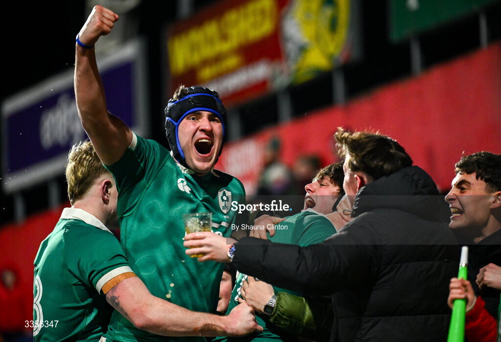 13 February 2026; Donnacha McGuire of Ireland, second from left, celebrates with team-mates and supporters after his side's third try during the U20 Six Nations Rugby Championship match between Ireland and Italy at Virgin Media Park in Cork. Photo by Shauna Clinton/Sportsfile