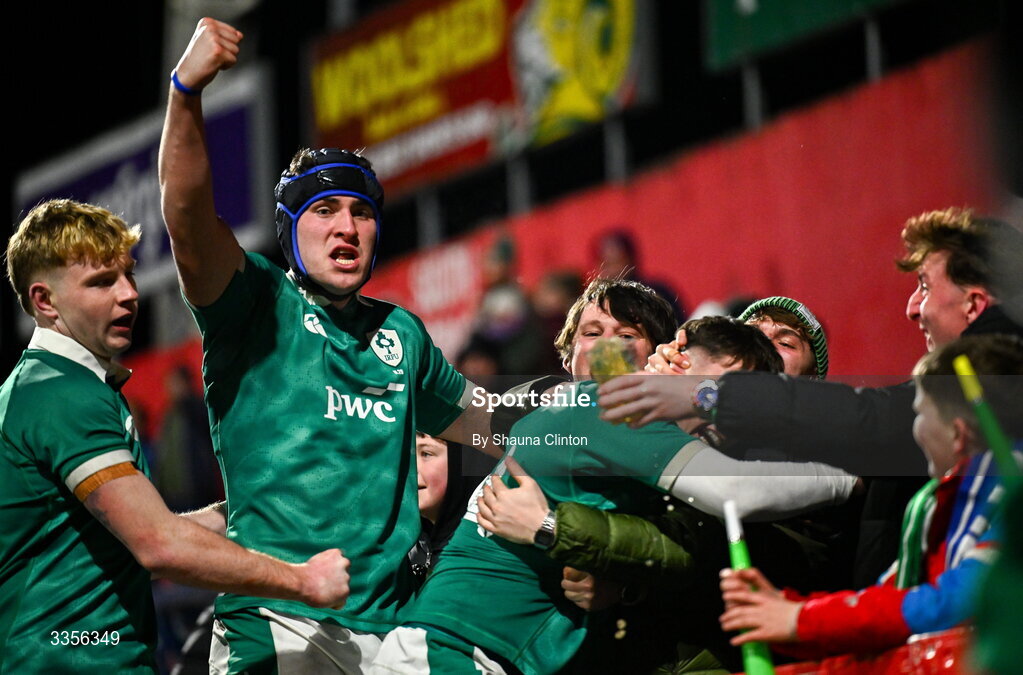 13 February 2026; Donnacha McGuire of Ireland, second from left, celebrates with team-mates and supporters after his side's third try during the U20 Six Nations Rugby Championship match between Ireland and Italy at Virgin Media Park in Cork. Photo by Shauna Clinton/Sportsfile