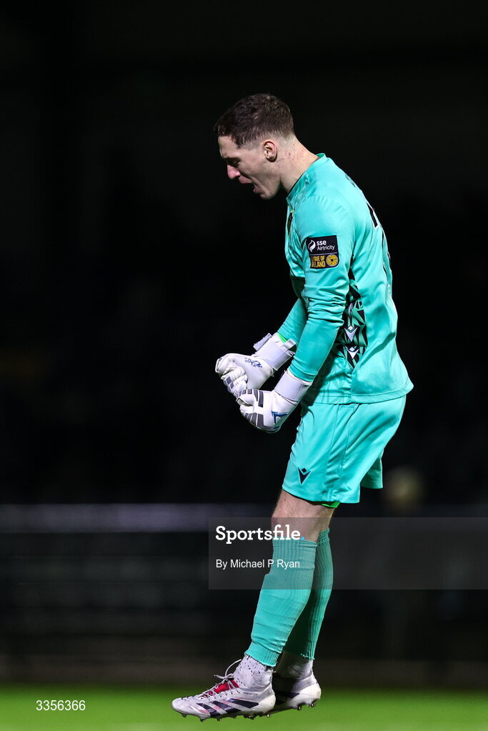 13 February 2026; Wexford goalkeeper Paul Martin celebrates his side's third goal scored by Jake Doyle, not pictured, during the SSE Airtricity Men's First Division match between Cobh Ramblers and Wexford at St Colman's Park in Cobh, Cork. Photo by Michael P Ryan/Sportsfile