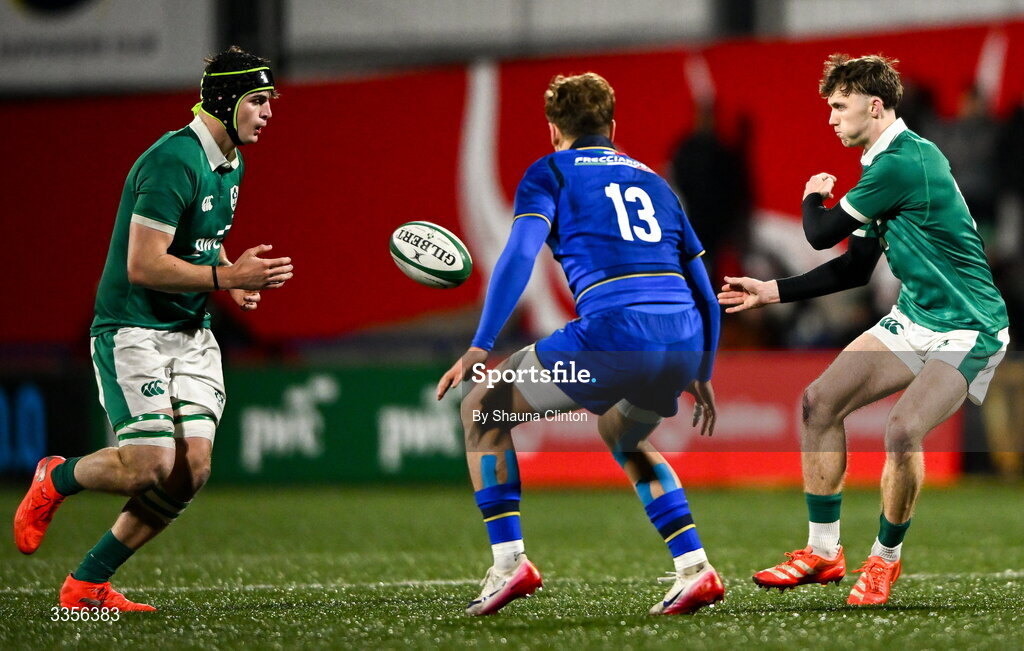 13 February 2026; Tom Wood of Ireland passes to team-mate Josh Neill during the U20 Six Nations Rugby Championship match between Ireland and Italy at Virgin Media Park in Cork. Photo by Shauna Clinton/Sportsfile