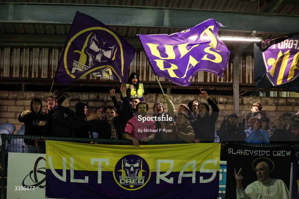 13 February 2026; Wexford supporters celebrate after their side's victory in the SSE Airtricity Men's First Division match between Cobh Ramblers and Wexford at St Colman's Park in Cobh, Cork. Photo by Michael P Ryan/Sportsfile