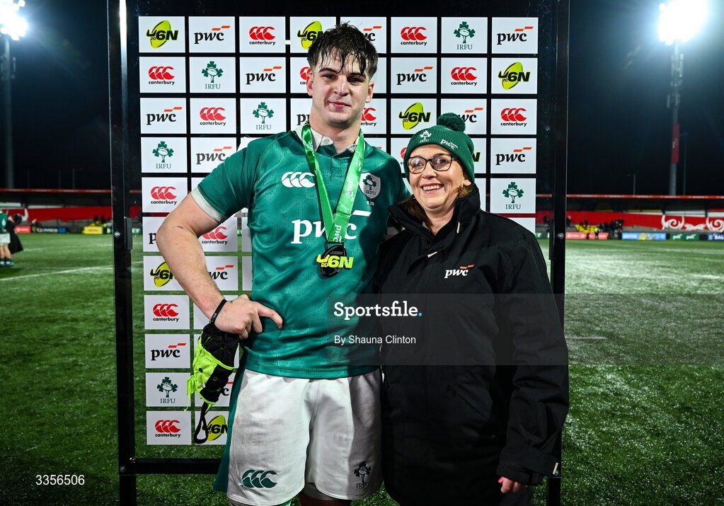 13 February 2026; Josh Neill of Ireland is presented with the player of the match award by Nicola Quinn of Pwc Cork during the U20 Six Nations Rugby Championship match between Ireland and Italy at Virgin Media Park in Cork. Photo by Shauna Clinton/Sportsfile