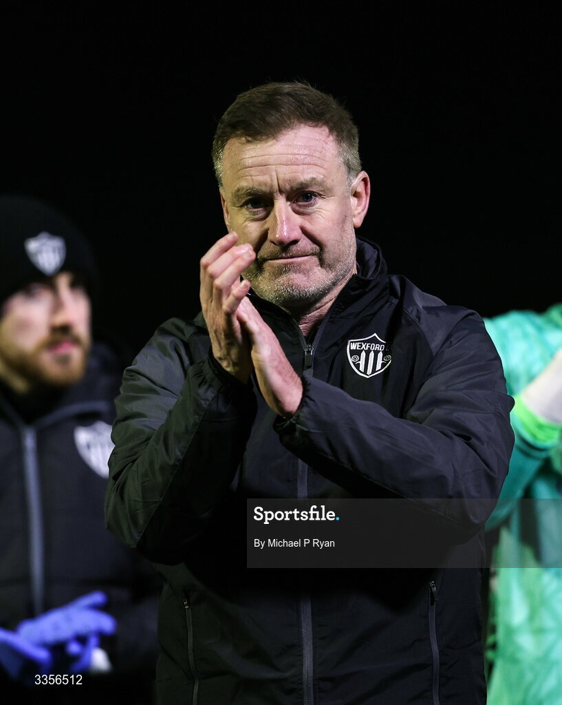 13 February 2026; Wexford manager Stephen Elliott acknowledges his side's supporters after the SSE Airtricity Men's First Division match between Cobh Ramblers and Wexford at St Colman's Park in Cobh, Cork. Photo by Michael P Ryan/Sportsfile