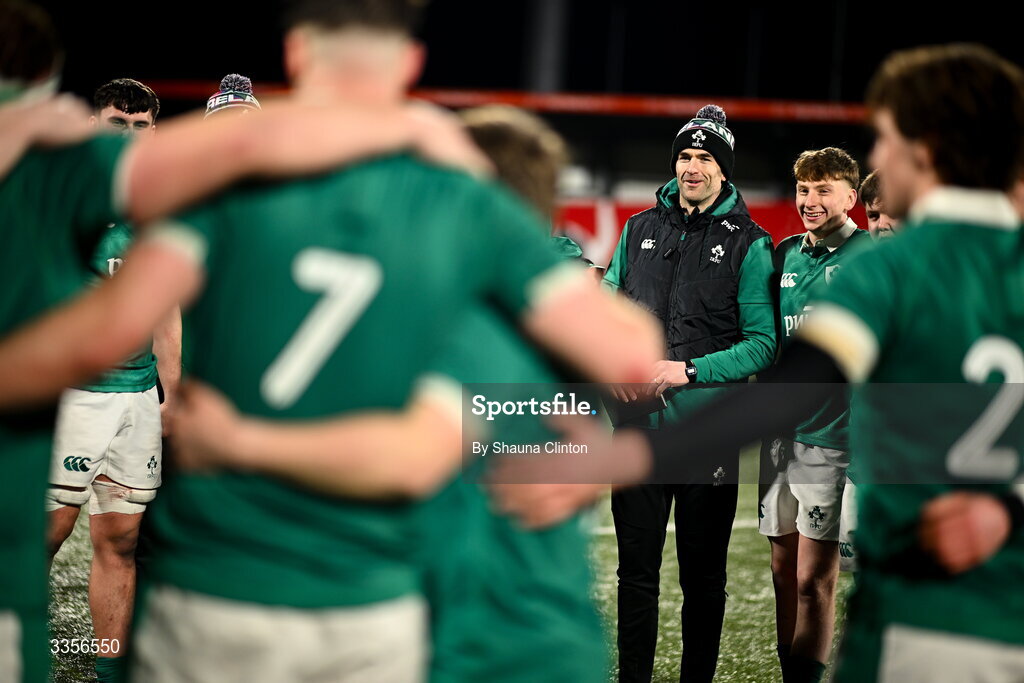 13 February 2026; Ireland head coach Andrew Browne, centre, speaks to his players after their side's victory in the U20 Six Nations Rugby Championship match between Ireland and Italy at Virgin Media Park in Cork. Photo by Shauna Clinton/Sportsfile