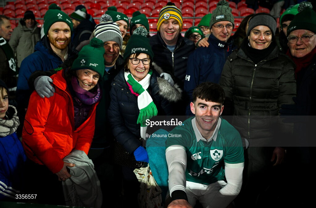 13 February 2026; Noah Byrne of Ireland with friends and family after his side's victory in the U20 Six Nations Rugby Championship match between Ireland and Italy at Virgin Media Park in Cork. Photo by Shauna Clinton/Sportsfile