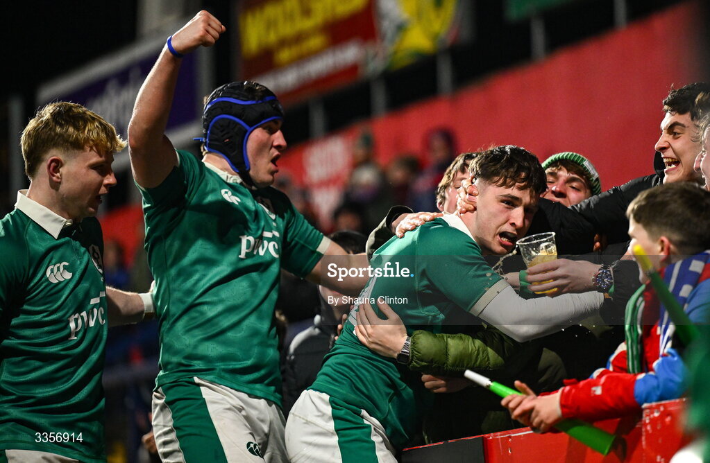 13 February 2026; Derry Moloney of Ireland, centre, celebrates with team-mates and supporters after scoring his side's third try during the U20 Six Nations Rugby Championship match between Ireland and Italy at Virgin Media Park in Cork. Photo by Shauna Clinton/Sportsfile