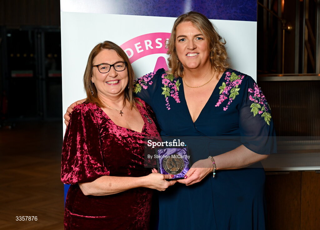 14 February 2026; Caroline Hughes of Man O’War, Dublin, is presented with her graduation medallion by Uachtarán Cumann Peil Gael na mBan Trina Murray at the Learn to Lead LGFA Female Leadership Programme graduation evening at The Carlton Hotel in Santry, Dublin. The Learn to Lead programme was devised to develop the next generation of leaders within Ladies Gaelic Football. Photo by Stephen McCarthy/Sportsfile